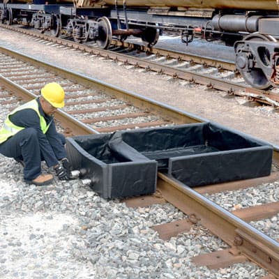 Environmental Considerations in Railroad Track Berm Design for Tanker Leaks